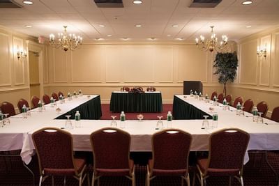 U-shaped meeting table set-up at Boxboro Regency Hotel