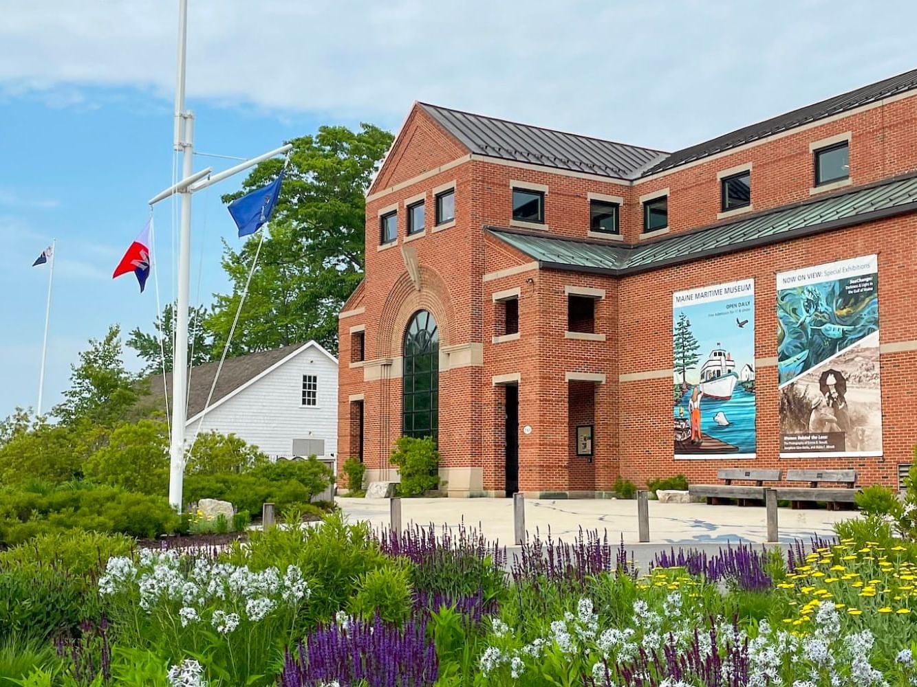 Exterior view with garden area of Maine Maritime Museum near Ogunquit Collection