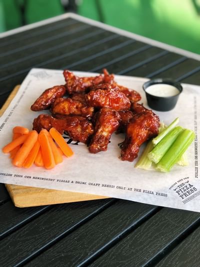 Closeup of Buffalo Wings served at Pizza Press in Anaheim Hotel