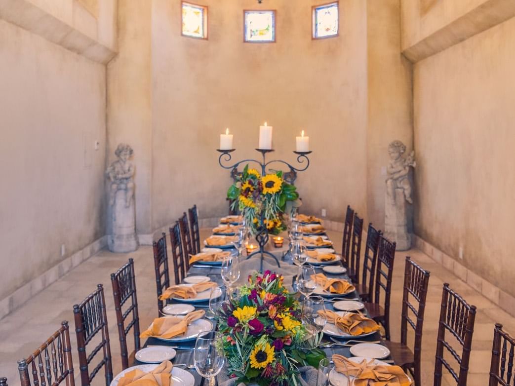 Dinner table set up inside Allegretto Abbey