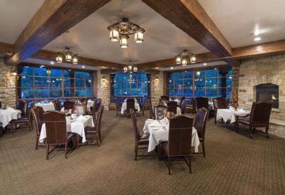 Set up banquets by the windows and carpet floors in Crescent Room at Hotel Park City Autograph Collection
