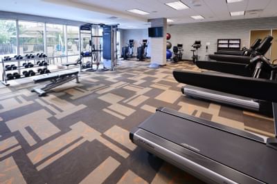 fitness center with exercise equipment