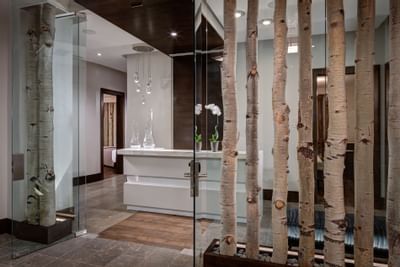 Silver Aspen Spa entrance with reception table at Stein Eriksen Residences