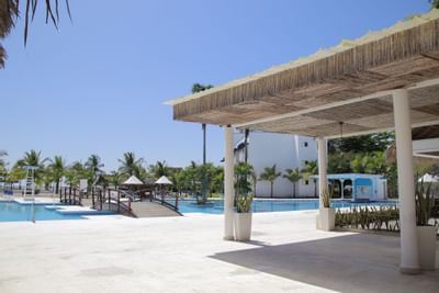 Pool area with the lounge at Playa Blanca Beach Resort