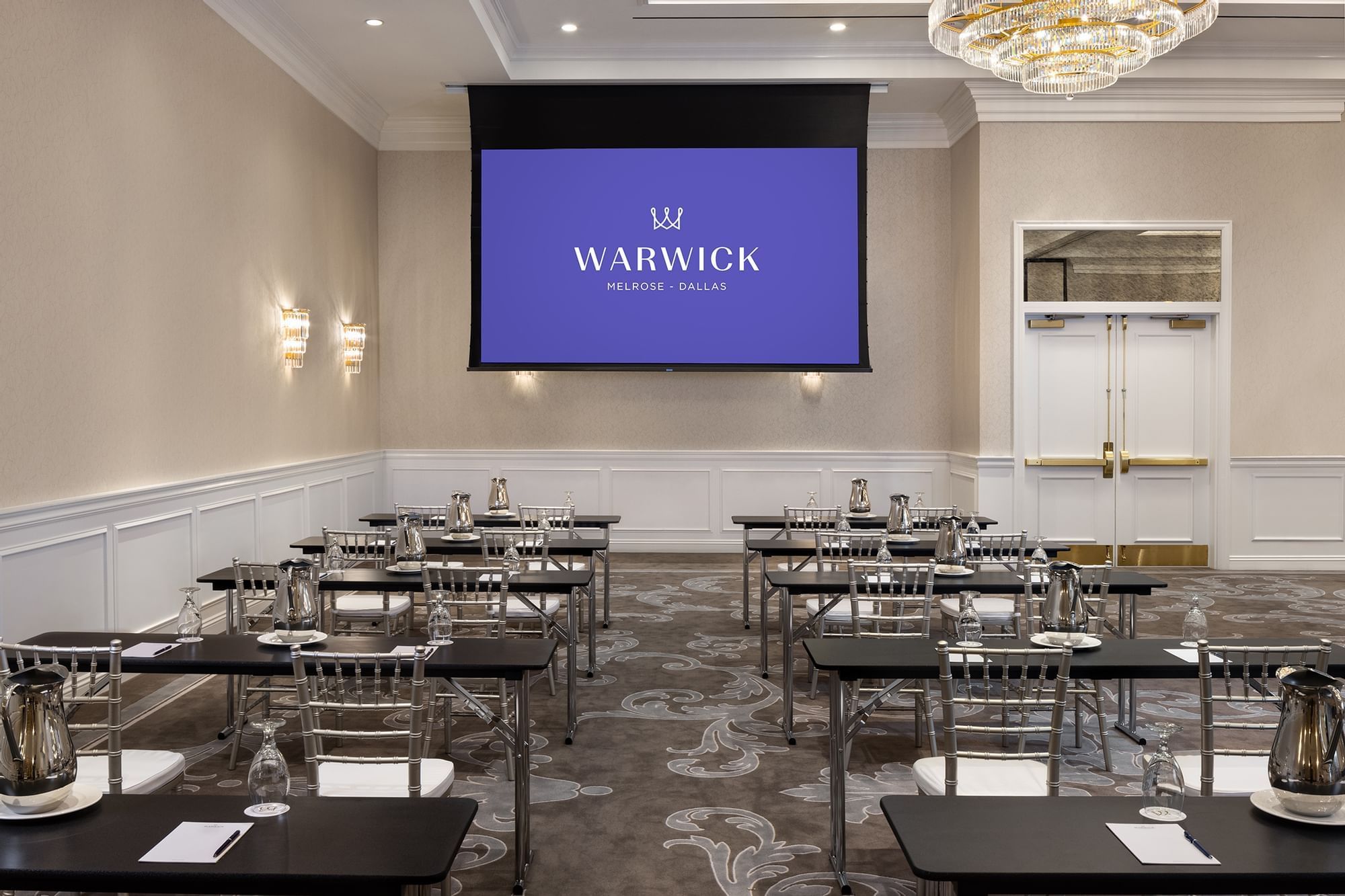 Classroom table set-up for an event at Warwick Melrose Dallas