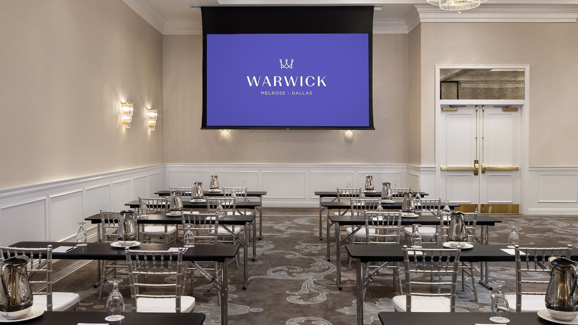 Classroom table set-up for an event at Warwick Melrose Dallas