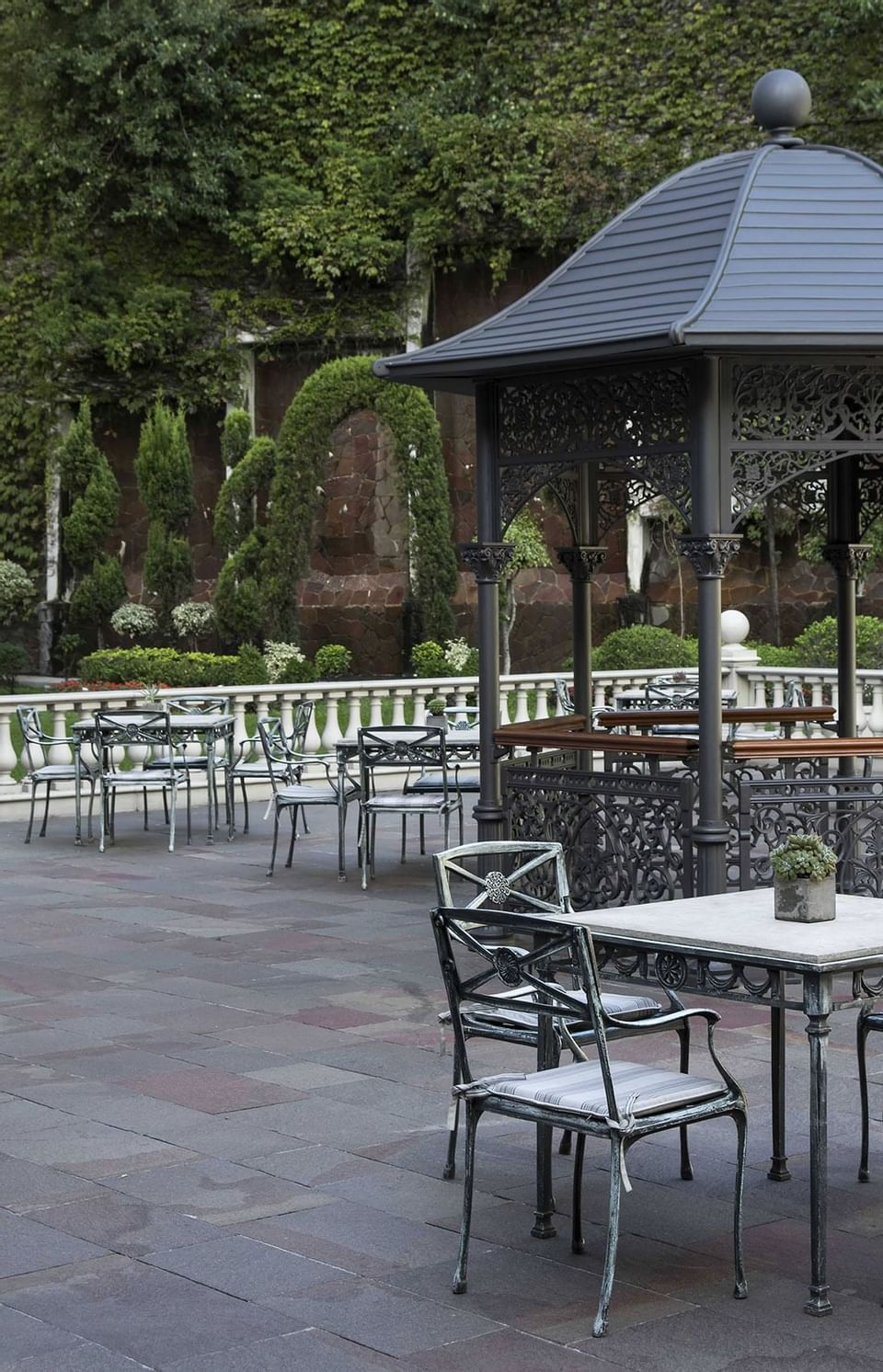 Tables & a Gazebo in a garden at Hotel Emperador Buenos Aires