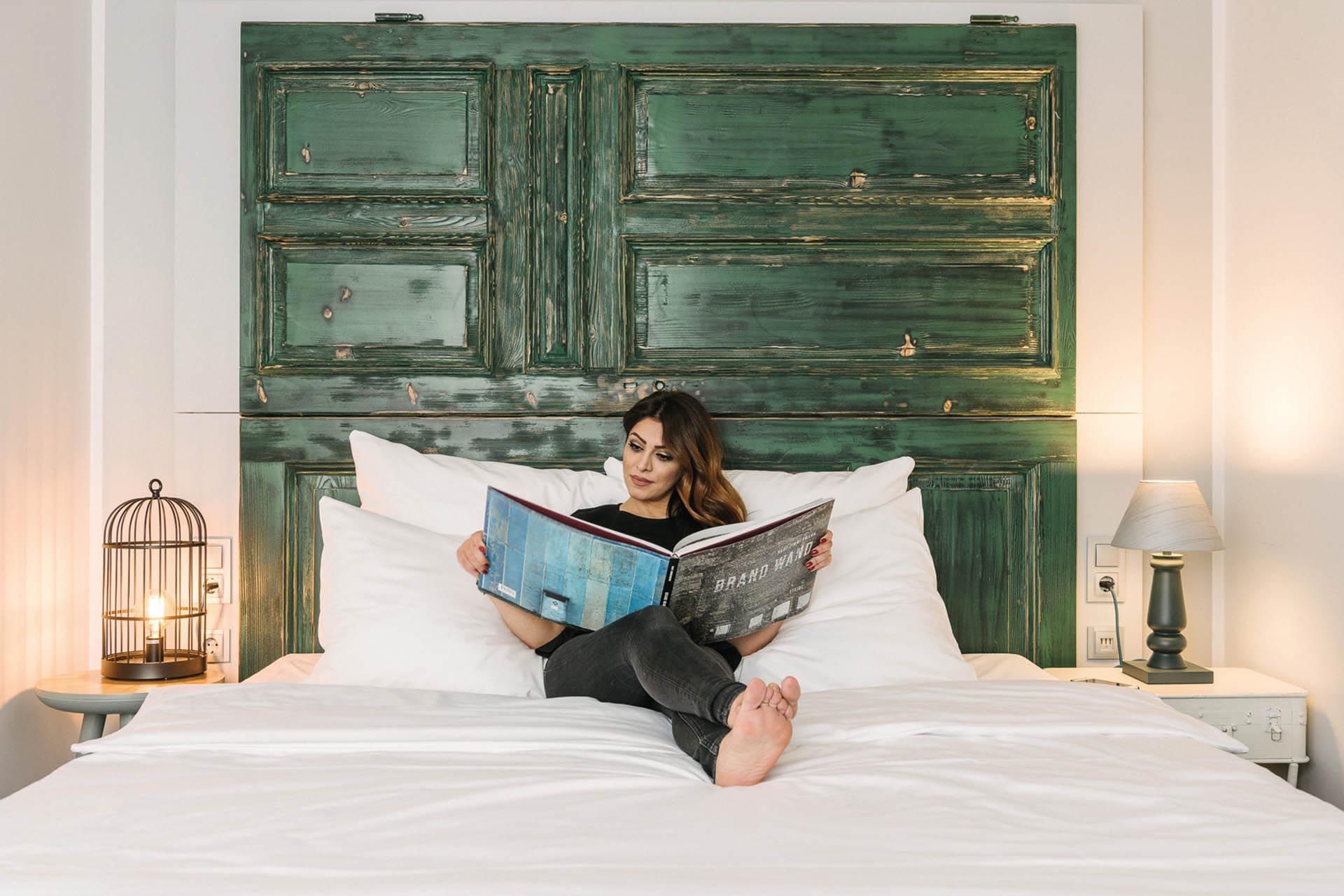 woman on bed reading