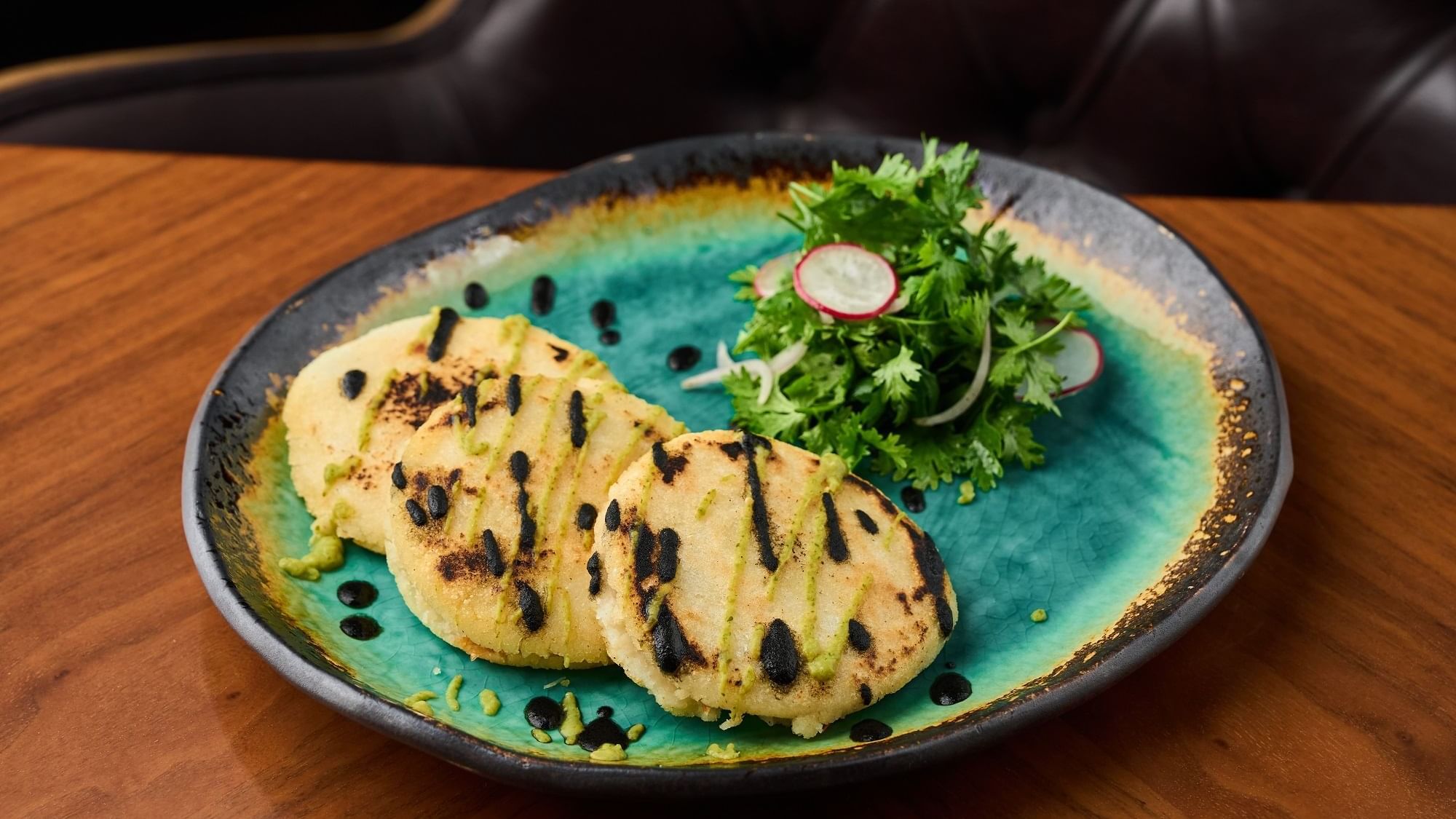 Salvadoran Pupusas plate served in Pacific Groove Restaurant & Lounge at Paramount Hotel Dubai