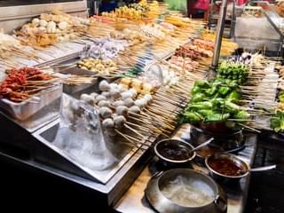 Variety of food in Jalan Alor Food Street, St Giles Boulevard