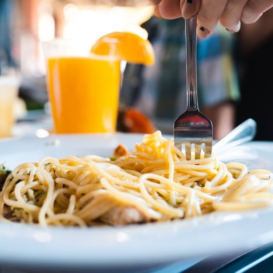 Close-up of fork on a spaghetti dish at Hotel Coral y Marina