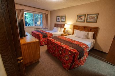 View of bedroom with two beds at Wedgewood Resort 