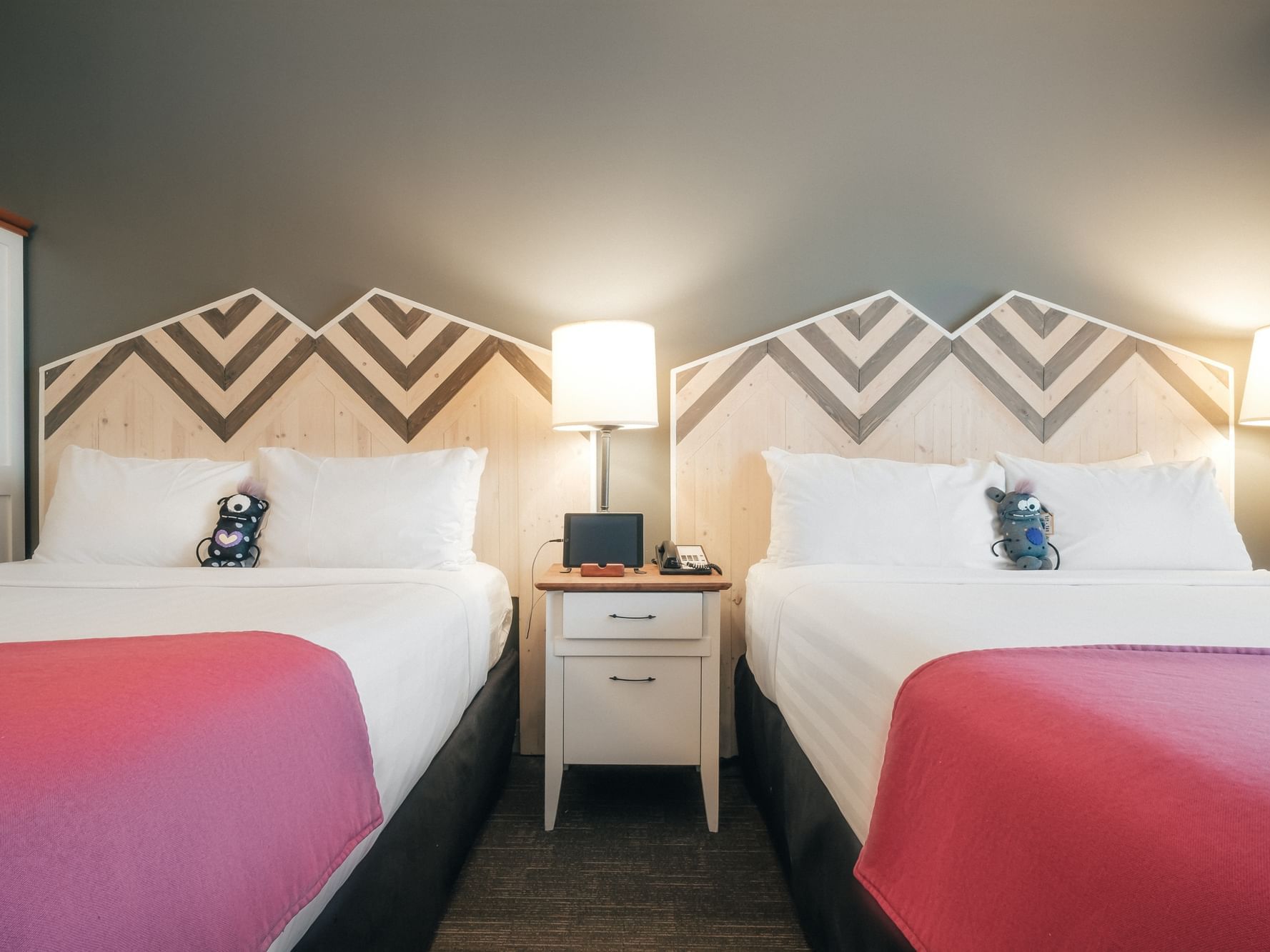 Twin beds in Queen Queen Studio Deluxe at Summit Lodge