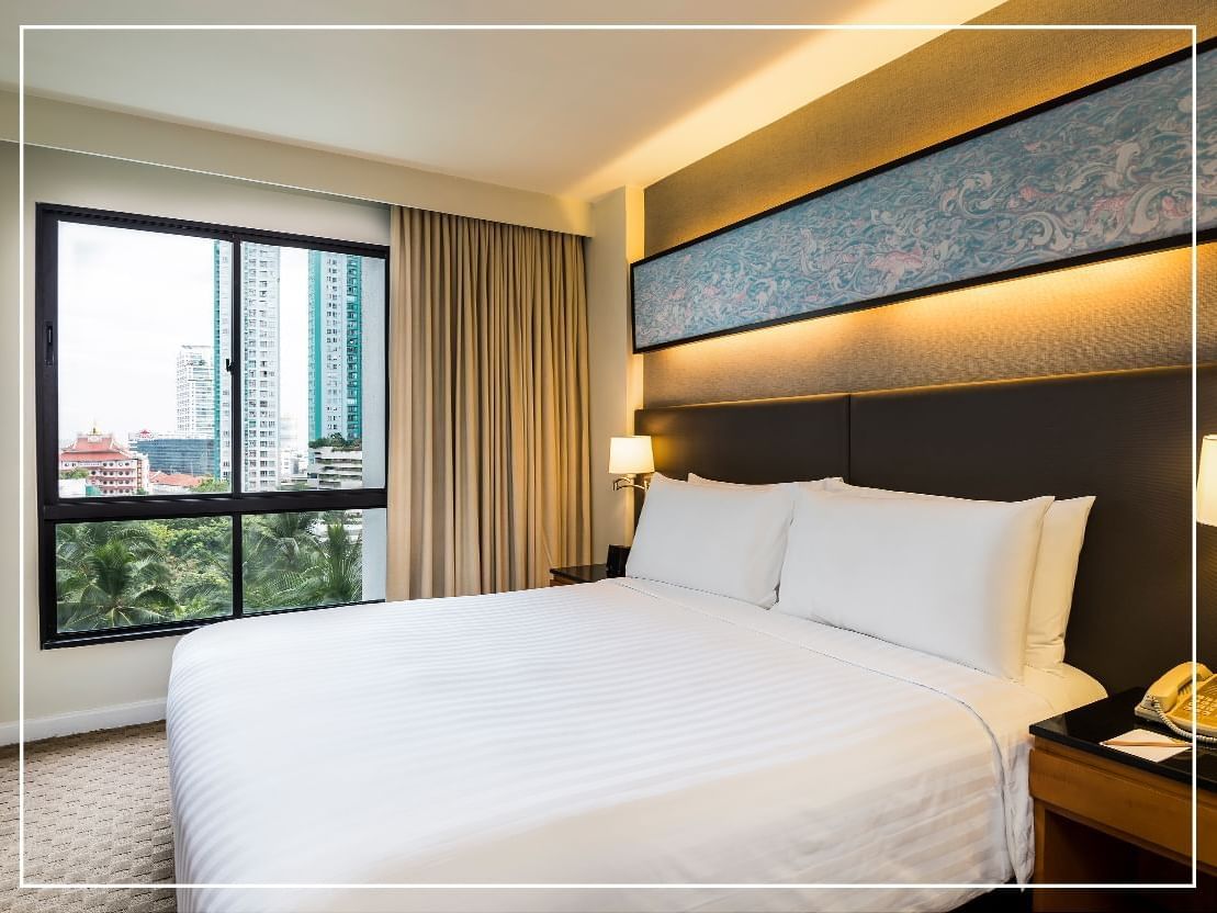 King bed in Deluxe One Bedroom Suite, Chatrium Residence Sathon