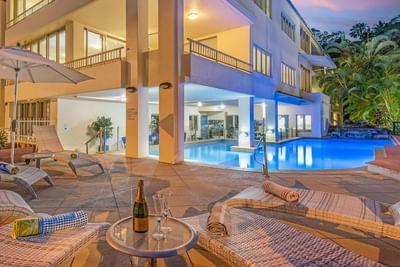 Sunbeds by the outdoor pool area at Silkari Reflections