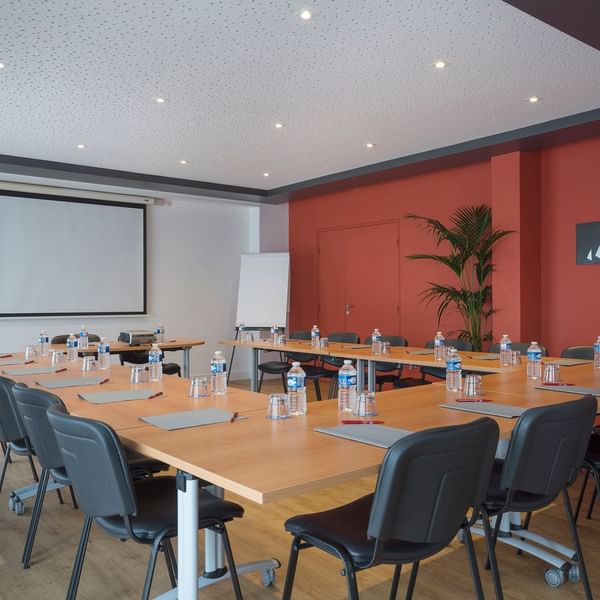 U-style table arrangement in a meeting room at Originals Hotels