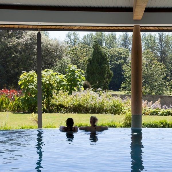 women swimming in Cornwall infinity pool