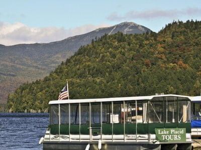 A closeup of a tour boat of Lake Placid Tours near Peaks Resort
