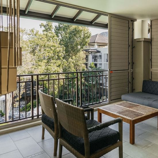 Sofa with balcony at Pullman Palm Cove Sea Temple Resort & Spa