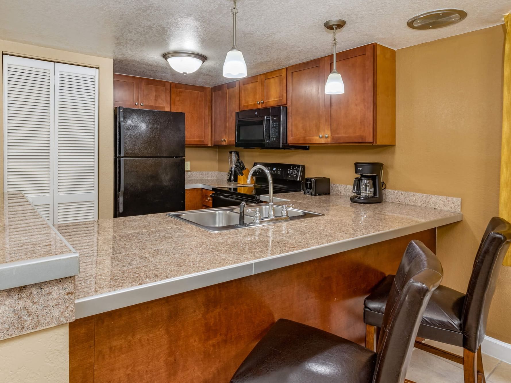 Kitchen of Two Bedroom Suite at Legacy Vacation Resorts