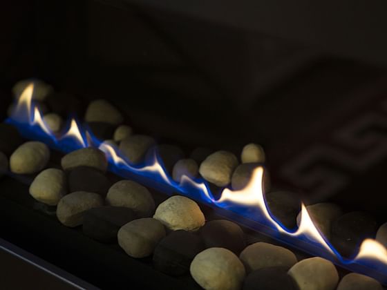 Close-up of a blazing fireplace at Hotel Jackson