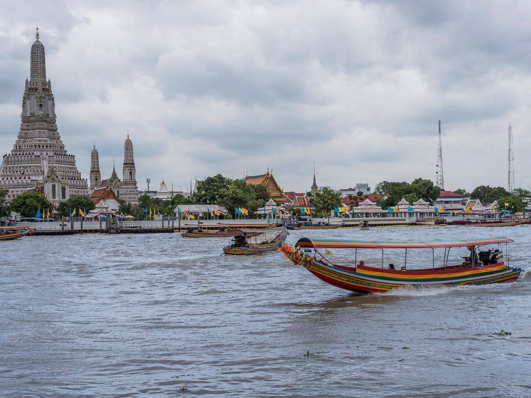 Boats on Chao Phraya River near Chatrium Residence Riverside