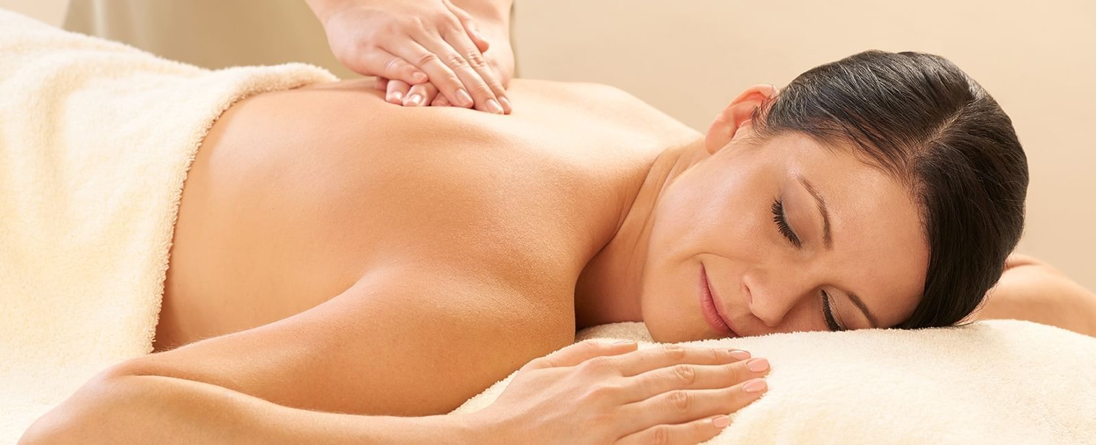 A lady receiving a massage at the Spa in the hotel