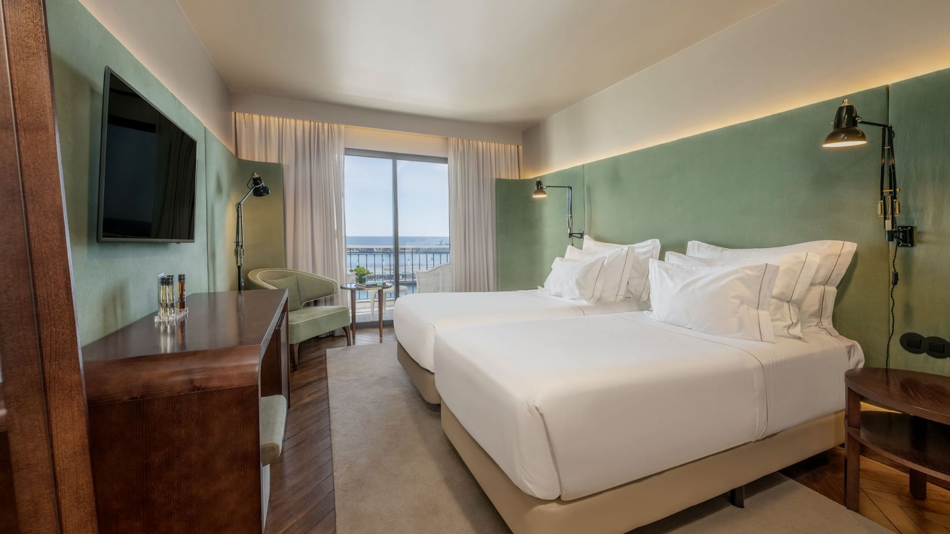 Twin beds in Ocean View Room at Bensaude Hotels Collection