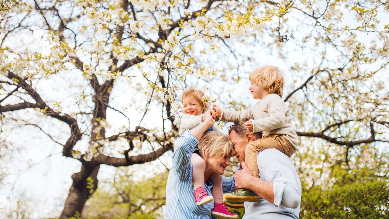 Grandparents playing with kids during spring break in Prince George.