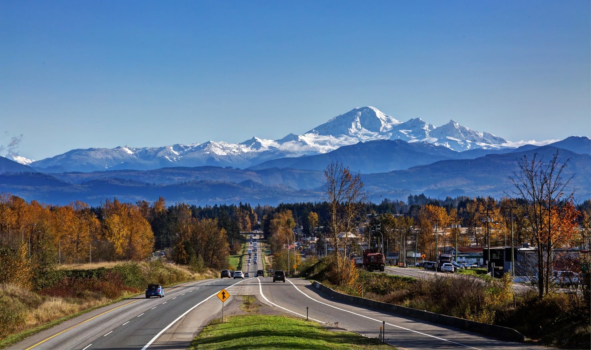 Road in valley with mountains in background