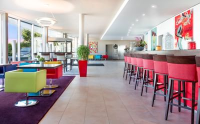 Interior view of the lobby area with comfy seating at Starling Hotels in Lausanne Switzerland