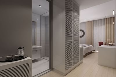 Bathroom entrance & bedroom interior at Azalai Hotel Dakar