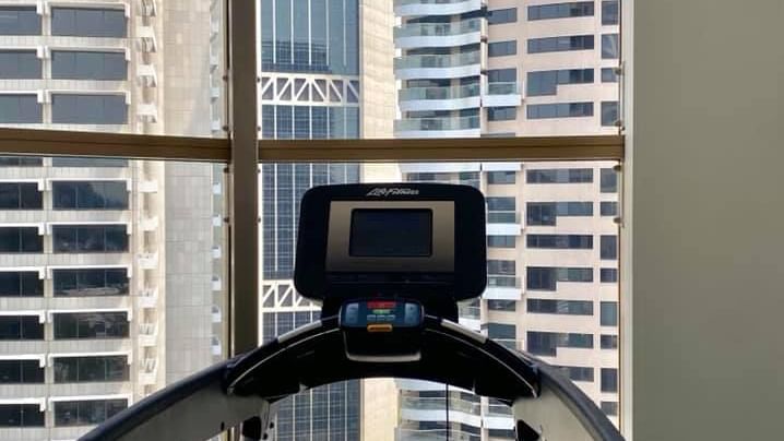 Treadmill of the gym at The Sebel Quay West Suites Sydney