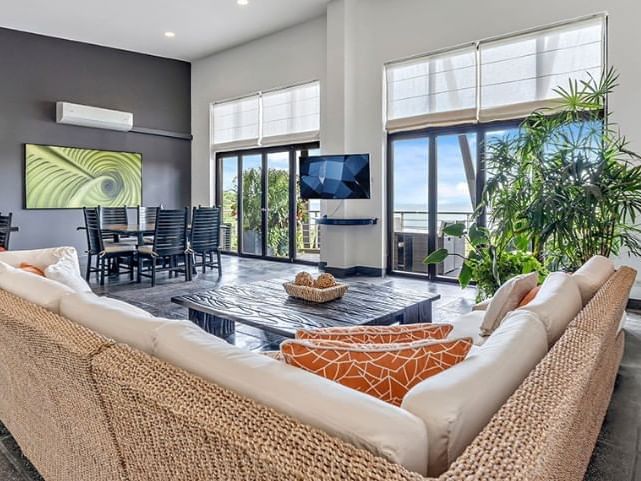 Comfy sofa and a coffee table in the living area of Penthouses at Los Altos Resort