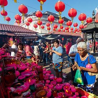 Chinese are praying in the temple during a festival