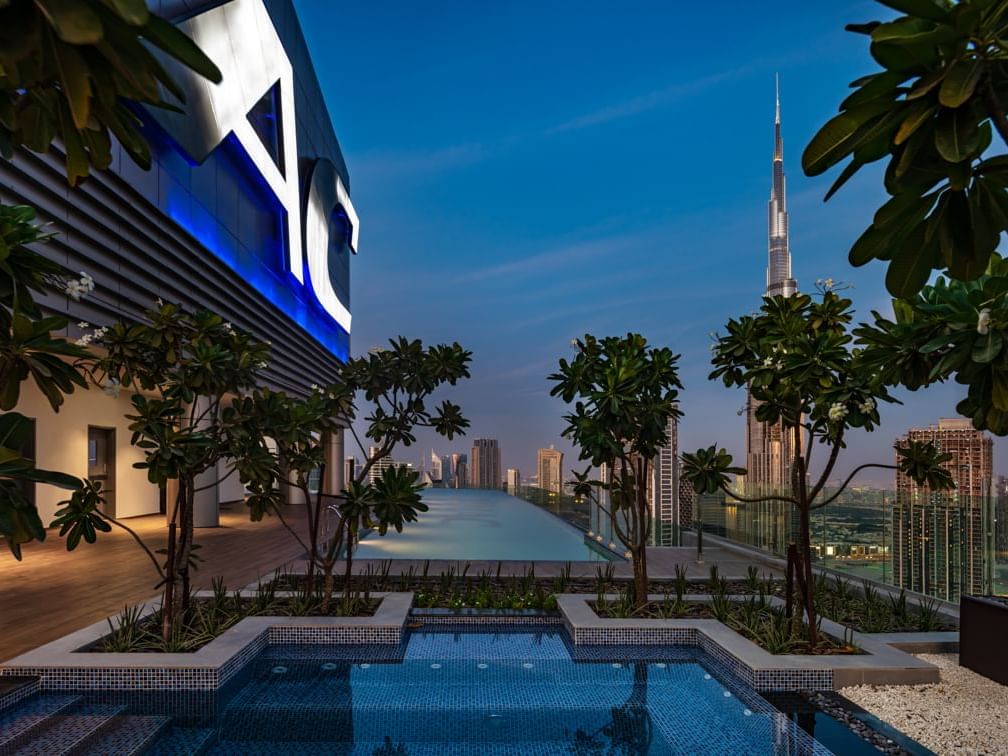 Pool on Malibu Sky Lounge & Bar and a city skyline from Paramount Hotel Midtown