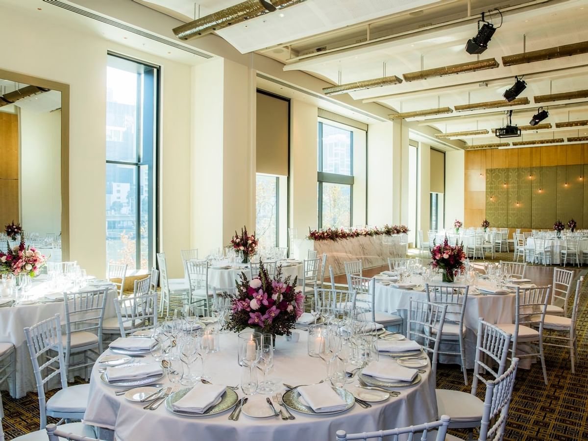 Banquet tables arranged in Garden Room at Crown Melbourne hotel