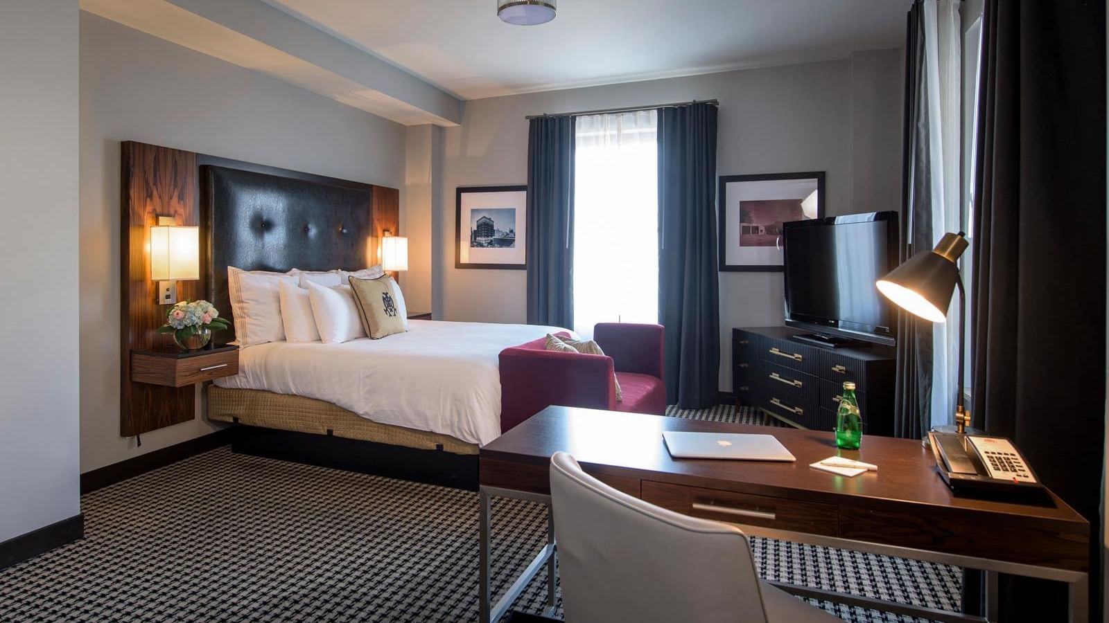 TV, bed & working table in Luxury King at The Mayo Hotel