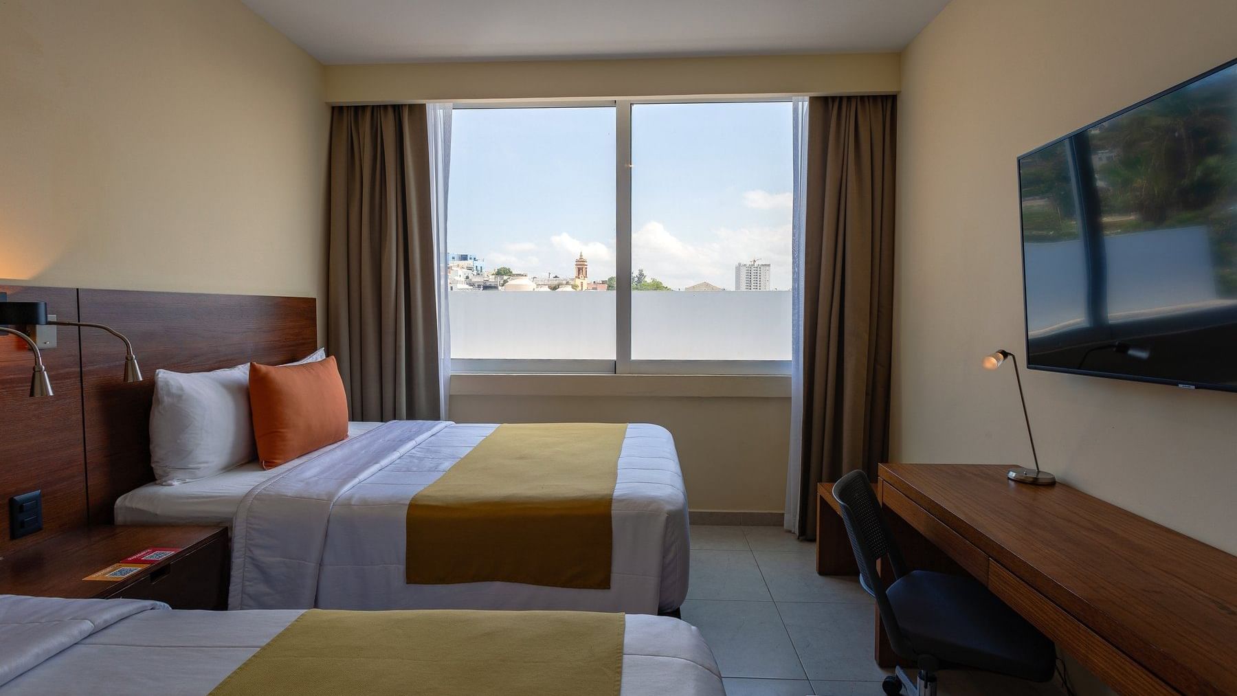 Lounge area in Junior Suite 1 King at Gamma Plaza Lxtapa