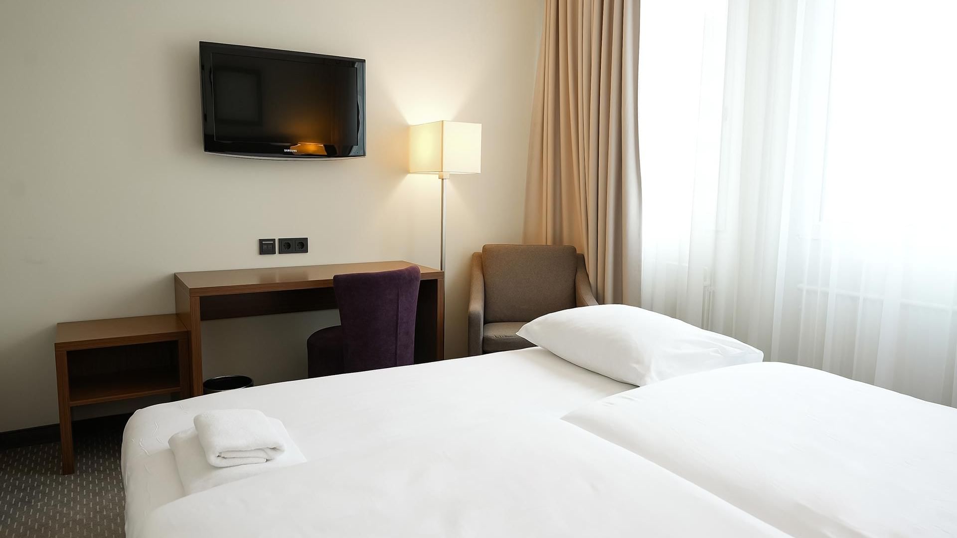 Spacious Standard Triple Room for Small Families at Sylter Hof Berlin