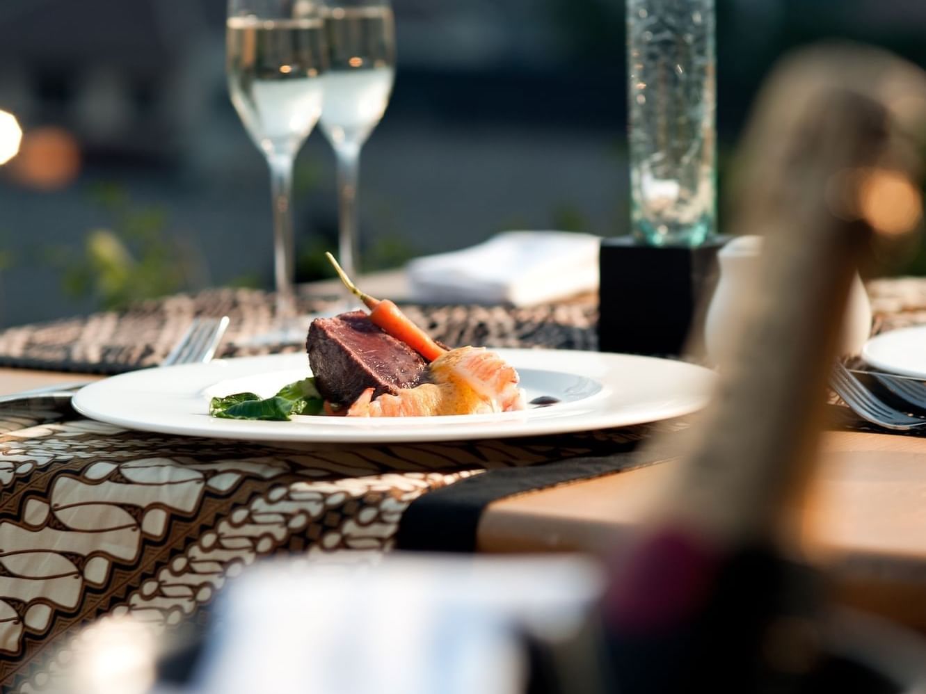 Signature steak dish served in restaurant at U Hotels & Resorts