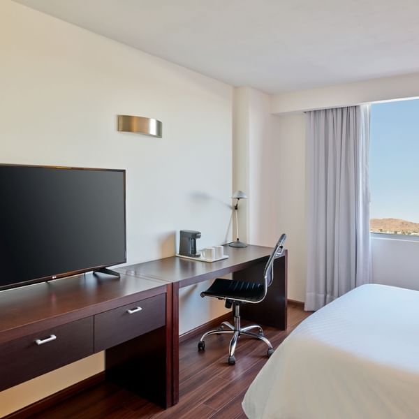 Work desk & outside view in Accessible Room at Fiesta Inn