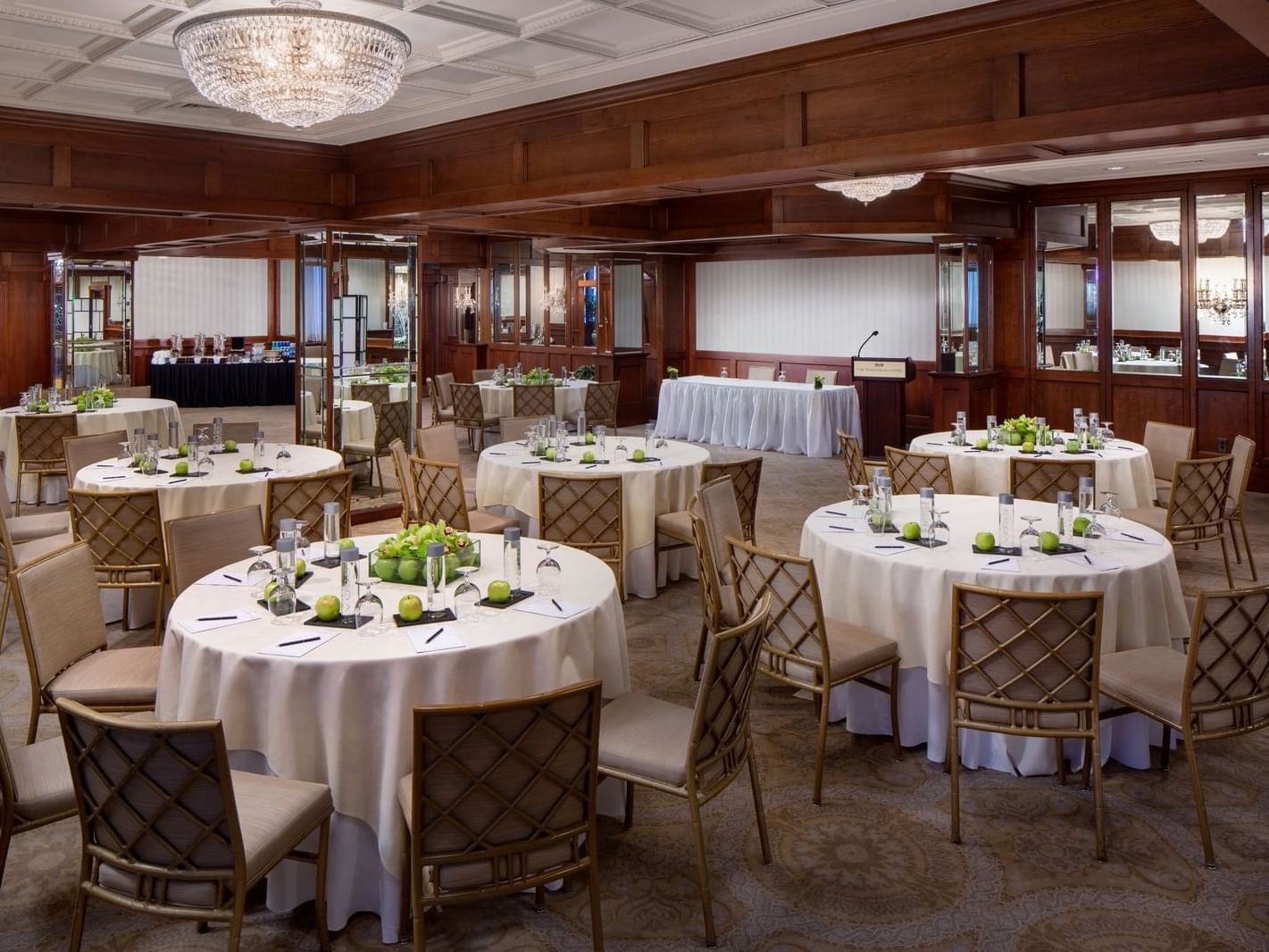 multiple tables in a spacious event room