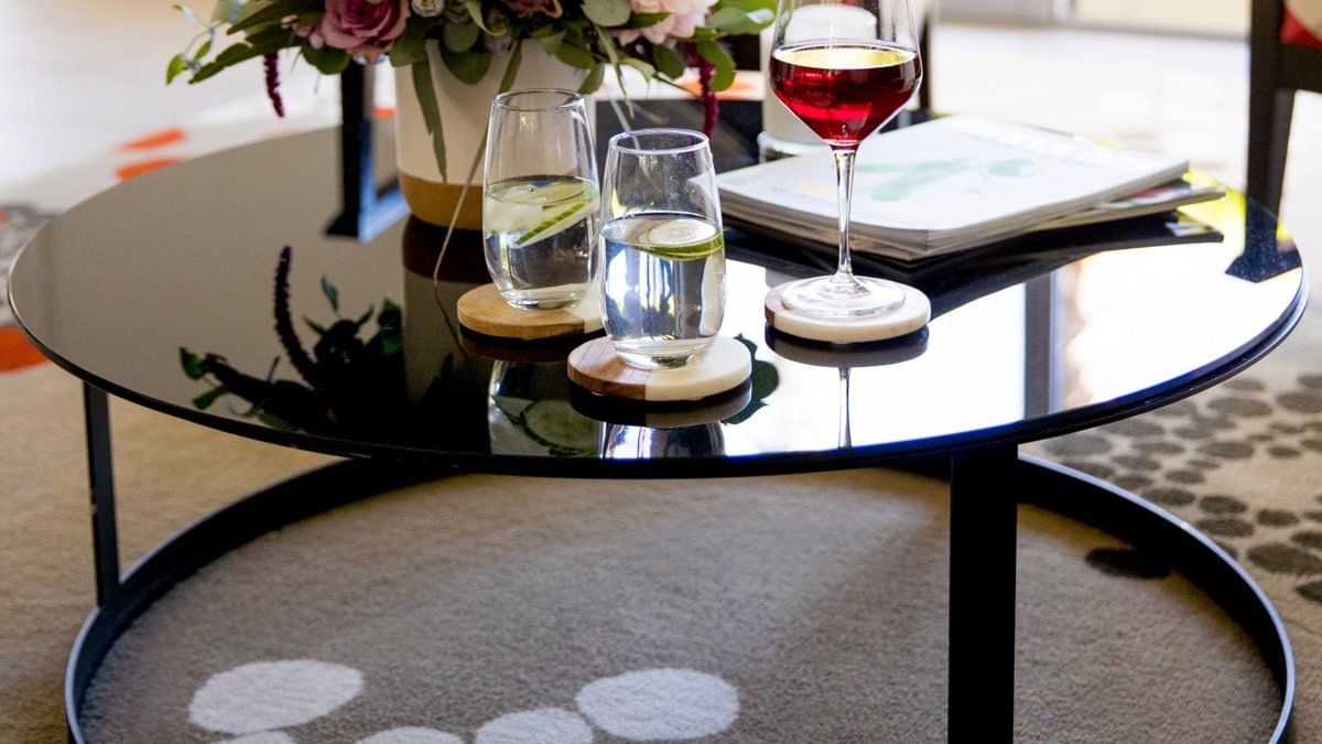 Glass of wine on the table in two bed room villa at Pullman Magenta Shores