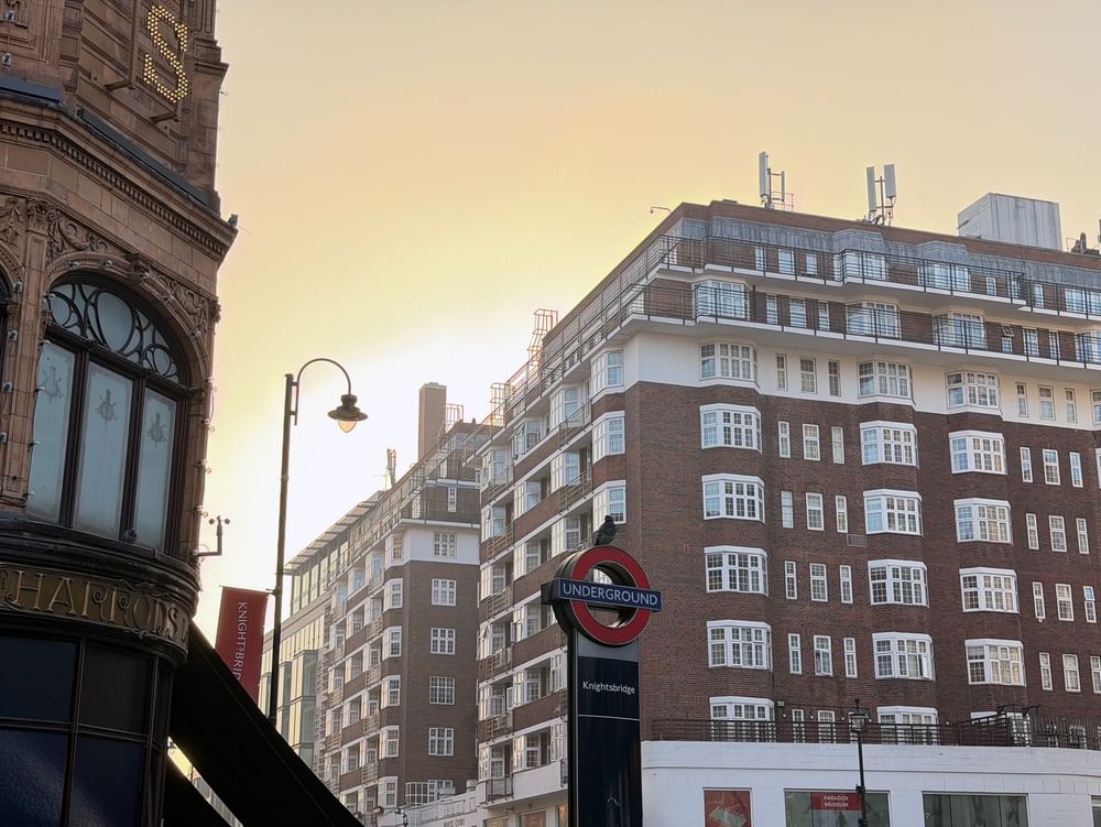 Iconic London Underground sign by a Harrods store near The Capital Hotel, Apartments and Townhouse