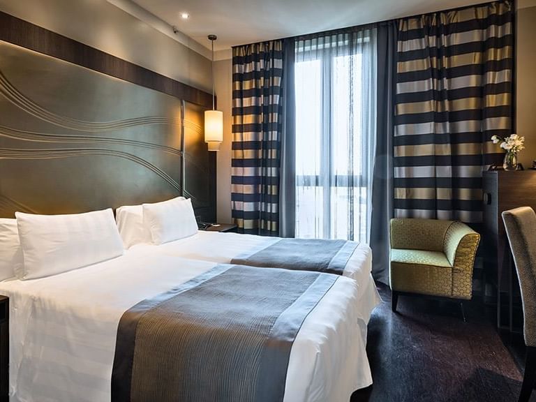 Interior of Superior Twin with Bed & Furniture at Extro Hotels