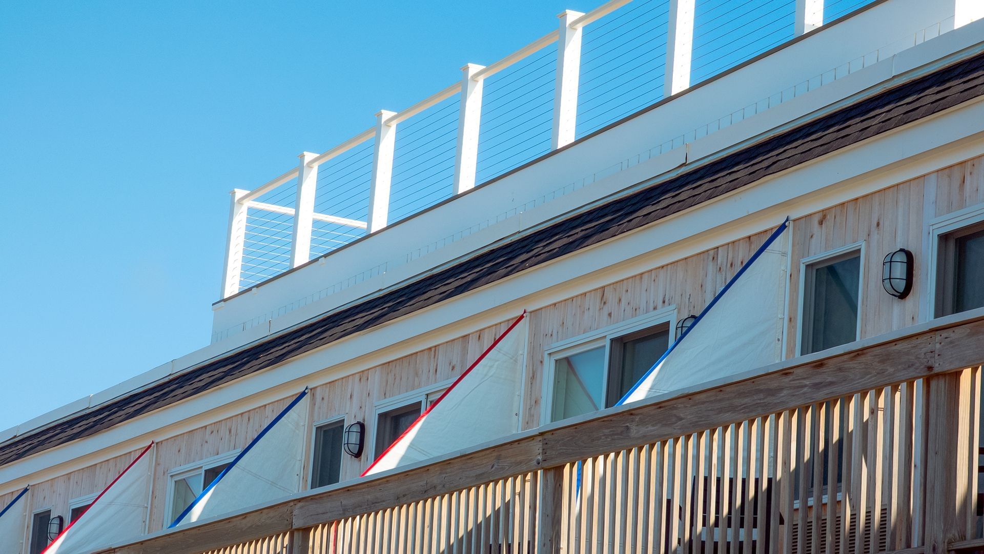 Close-up of the deck overlooking the beach at Falmouth Tides