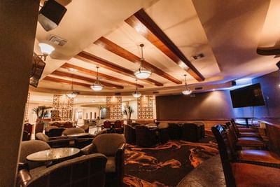 Lounge area with a TV in Lobby Bar at Araiza Mexicali