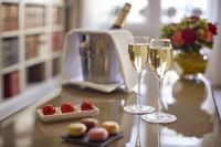 Champagne and strawberries on a table at Warwick Hotels and Resorts
