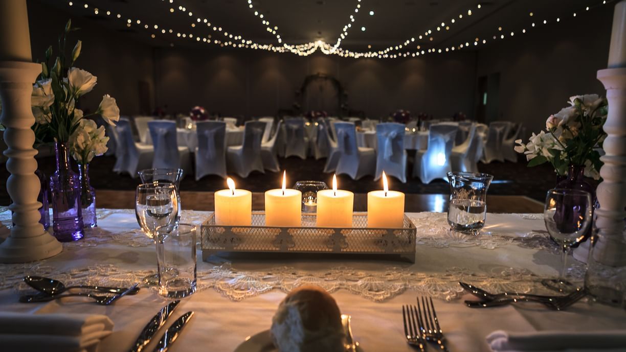 Wedding hall decorated with candles and lights at Mercure Kooindah Waters